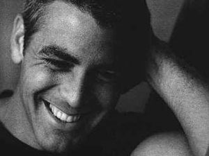 BRAD PITT SEGATO IN DUE - Clooney smile - Gay.it Archivio